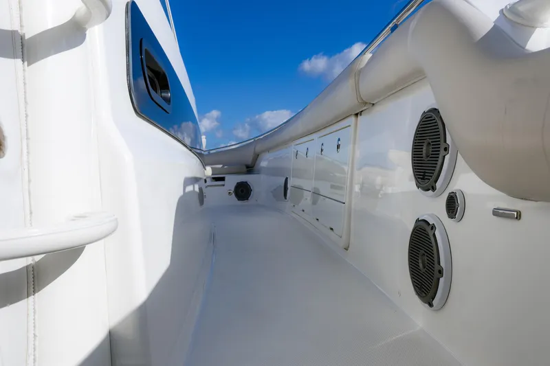 Slide: The Image of 2017 Boston Whaler 420 Outrage boat interior with speakers and sleek design. - 9