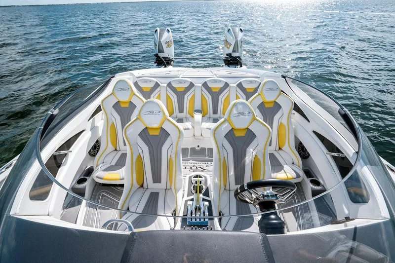 Slide: The Image of Luxury MTI 390X 2022 speedboat interior with stylish seating on open water. - 5