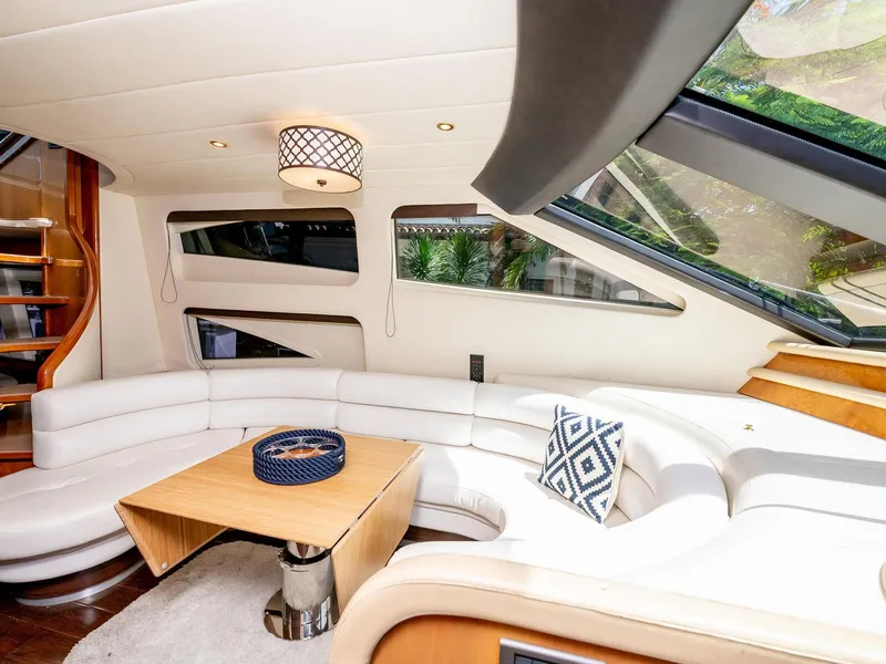 Slide: The Image of Luxurious interior of 2000 Azimut 70 Sea-Jet yacht with modern seating and large windows. - 13