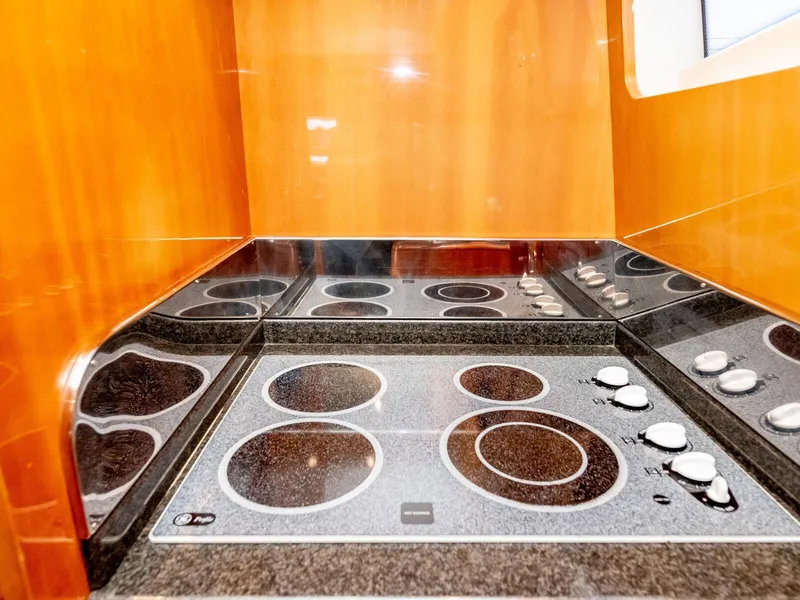 Slide: The Image of Modern kitchen stove on 2000 Azimut 70 Sea-Jet yacht. - 15