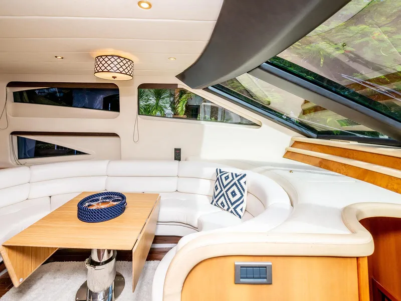 Slide: The Image of Luxurious interior of 2000 Azimut 70 Sea-Jet yacht with elegant seating and modern decor. - 23