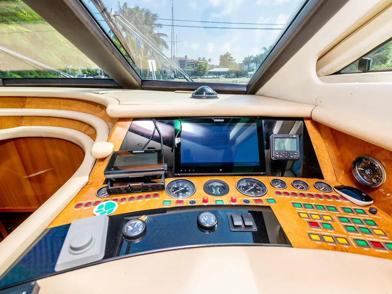 Slide: The Image of Cockpit of 2000 Azimut 70 Sea-Jet yacht with navigation instruments and controls. - 26