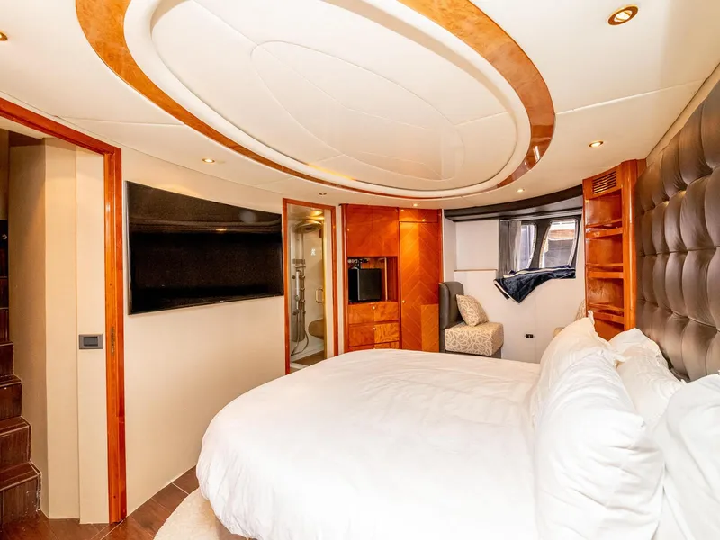 Slide: The Image of Luxurious bedroom interior of 2000 Azimut 70 Sea-Jet yacht with modern amenities. - 33