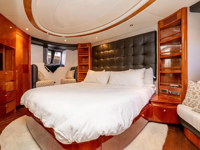 Slide: The Image of Luxurious bedroom interior of 2000 Azimut 70 Sea-Jet yacht with elegant wood finishes. - 35