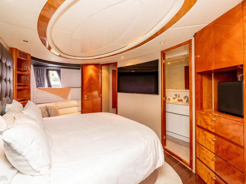 Slide: The Image of Luxurious bedroom interior of 2000 Azimut 70 Sea-Jet yacht with elegant wood finishes. - 39