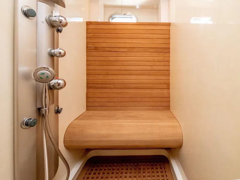 Slide: The Image of Luxurious shower with wooden bench on 2000 Azimut 70 Sea-Jet yacht. - 44