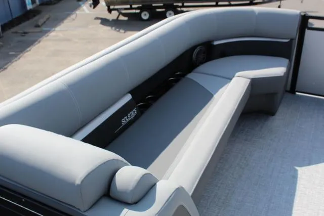 Slide: The Image of 2024 Harris Solstice 250 SL boat interior with sleek gray seating. - 21