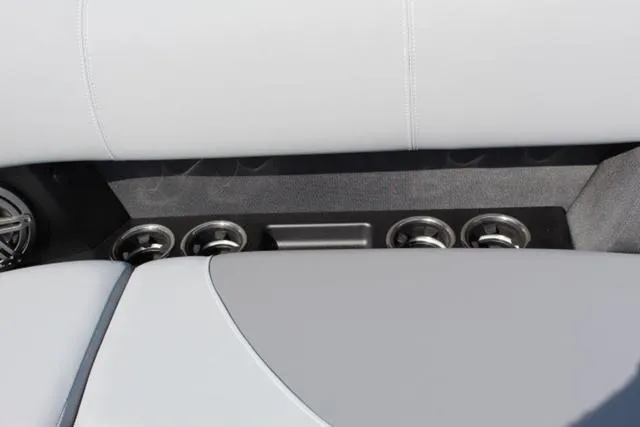 Slide: The Image of 2024 Harris Solstice 250 SL interior with cup holders and sleek seating design. - 24