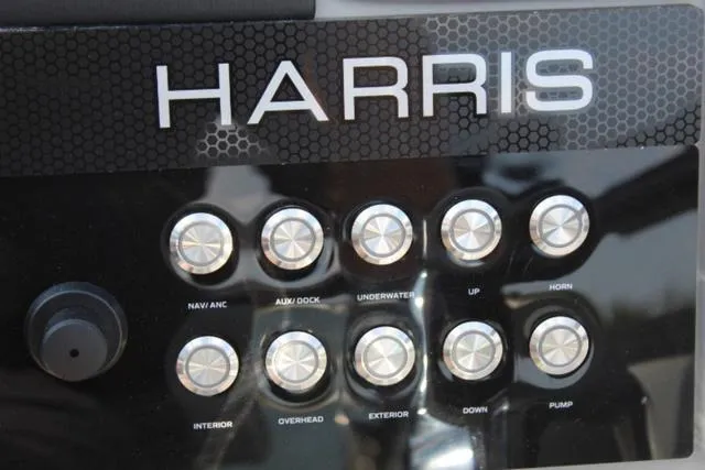 Slide: The Image of Control panel of 2024 Harris Solstice 250 SL boat with labeled buttons. - 30
