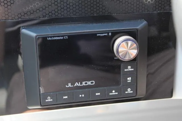 Slide: The Image of JL Audio MediaMaster 105 control panel in 2024 Harris Solstice 250 SL. - 32