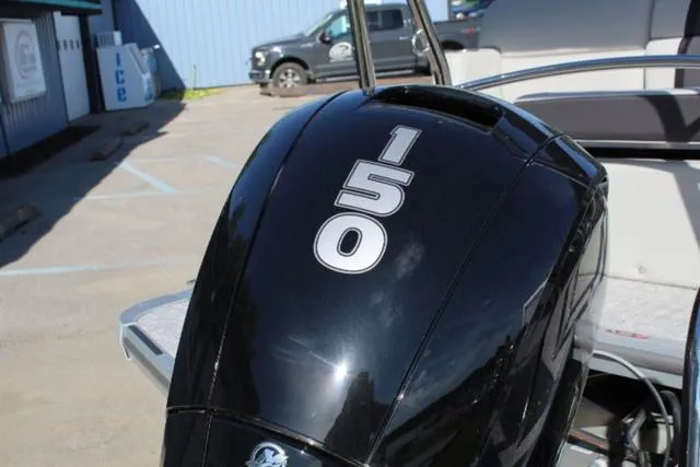 Slide: The Image of 2024 Harris Cruiser 230 CS boat engine with 150 horsepower. - 5