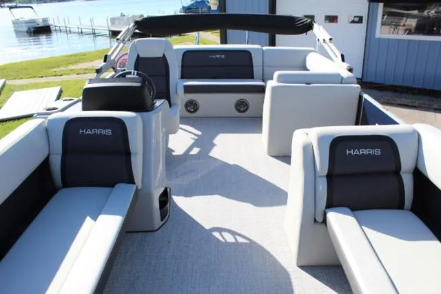 Slide: The Image of 2024 Harris Cruiser 230 CS pontoon boat interior with spacious seating and modern design. - 9