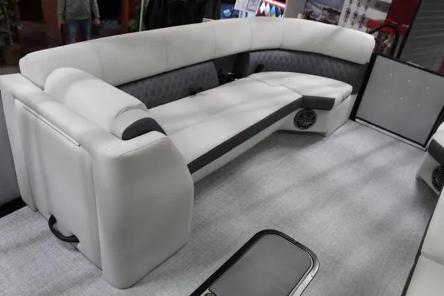 Slide: The Image of 2024 Harris Sunliner 250 SLDH boat interior with luxurious seating and modern design. - 22