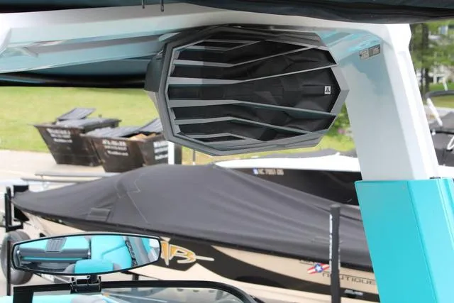 Slide: The Image of 2022 Nautique G23 Paragon boat with sleek speaker system and modern design. - 19