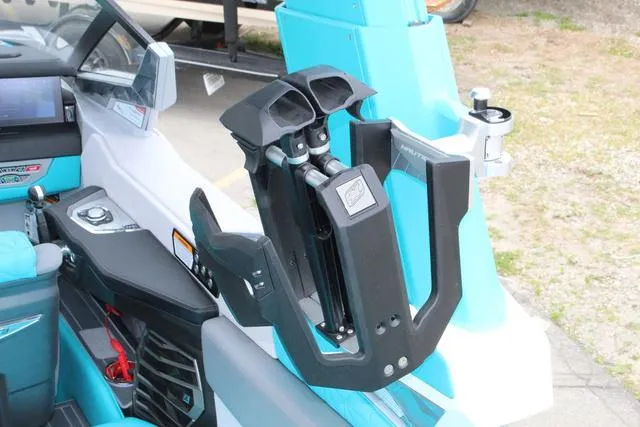 Slide: The Image of 2022 Nautique G23 Paragon boat interior with advanced wakeboard rack. - 20