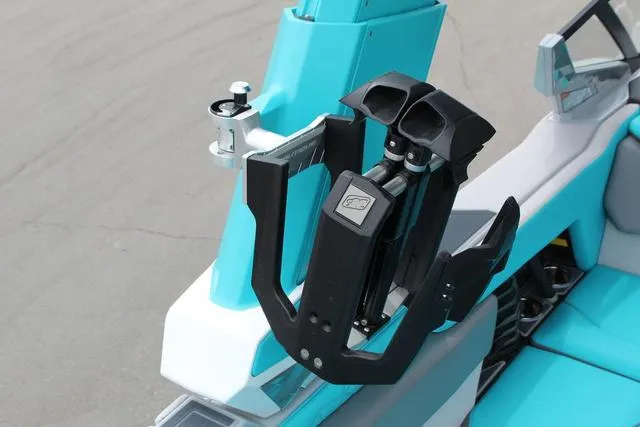 Slide: The Image of 2022 Nautique G23 Paragon boat interior with teal accents and advanced equipment. - 21