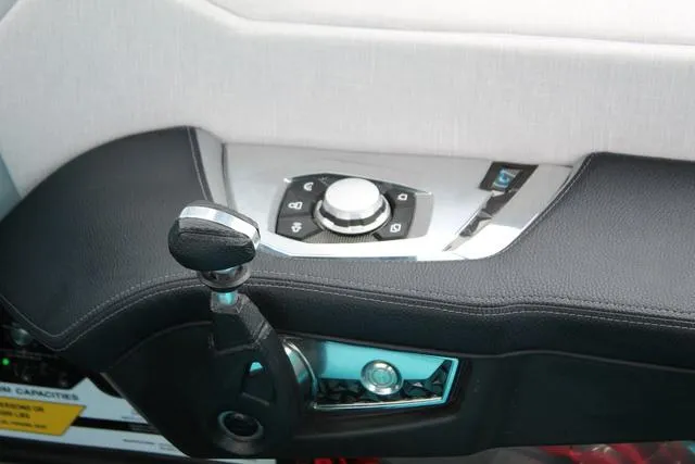 Slide: The Image of 2022 Nautique G23 Paragon control panel with sleek design and modern features. - 24