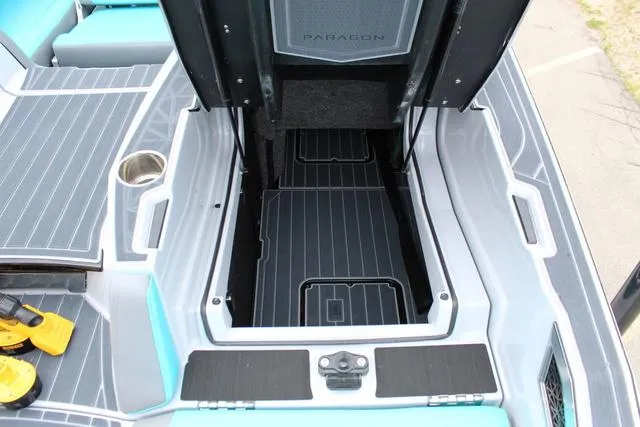 Slide: The Image of 2022 Nautique G23 Paragon boat storage compartment with sleek design and modern features. - 30