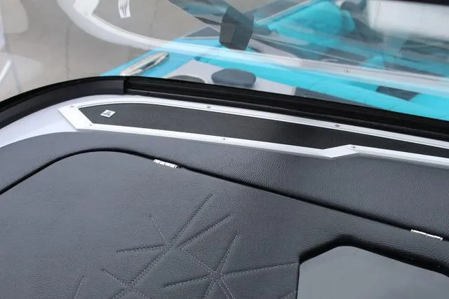 Slide: The Image of 2022 Nautique G23 Paragon dashboard with sleek design and modern detailing. - 32