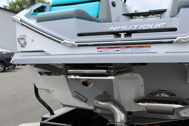 Slide: The Image of 2022 Nautique G23 Paragon boat rear view with sleek design and modern features. - 6