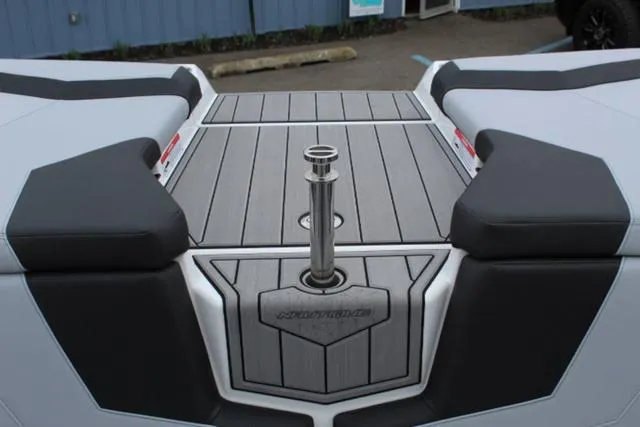 Slide: The Image of 2024 Nautique Super Air Nautique GS22 boat deck with sleek design and durable materials. - 27