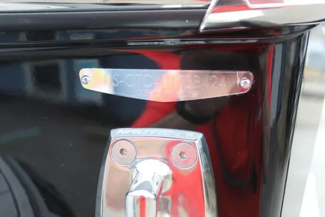 Slide: The Image of 2024 Nautique Super Air Nautique GS22 boat detail with identification plate. - 8