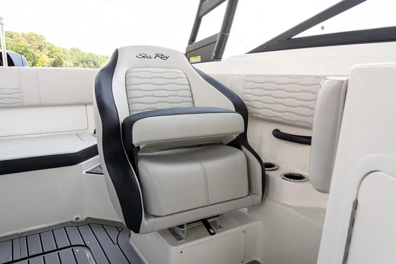 Slide: The Image of 2023 Sea Ray SPX 190 boat interior with stylish seating and modern design. - 14