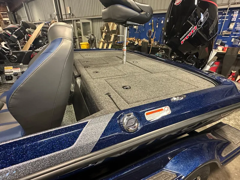 Slide: The Image of 2025 Nitro Z21 XL Pro boat interior with seating and storage compartments. - 13