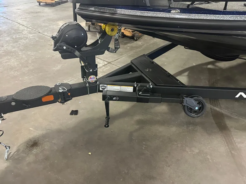 Slide: The Image of 2025 Nitro Z21 XL Pro boat trailer hitch in a garage setting. - 18