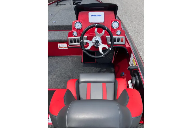 Slide: The Image of Interior of 2025 Nitro Z19 boat with red and gray seating and steering console. - 7