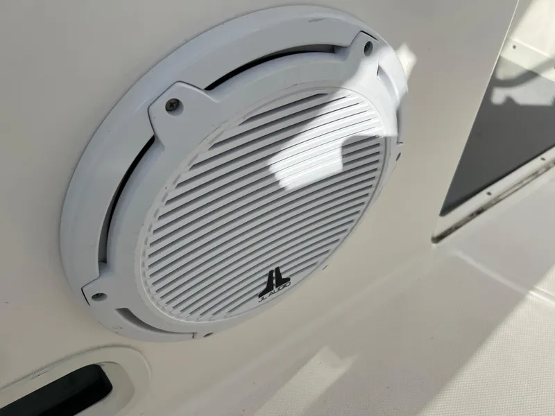 Slide: The Image of White JL Audio speaker on 2014 Everglades 350LX boat. - 25
