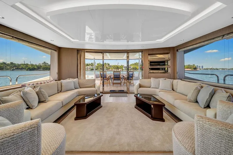 Slide: The Image of Luxurious interior of 2021 Sunseeker 86 Yacht with elegant seating and panoramic windows. - 12