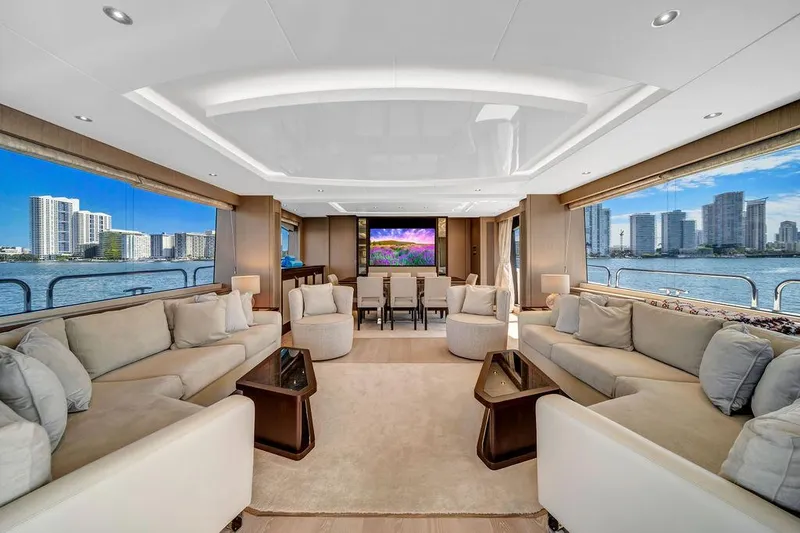 Slide: The Image of Luxurious interior of 2021 Sunseeker 86 Yacht with elegant seating and panoramic windows. - 13