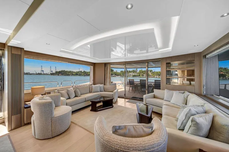 Slide: The Image of Luxurious interior of 2021 Sunseeker 86 Yacht with elegant seating and scenic ocean view. - 15