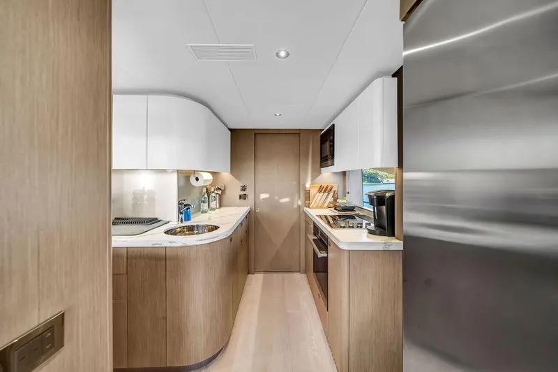 Slide: The Image of Modern kitchen interior of 2021 Sunseeker 86 Yacht with sleek design and appliances. - 20