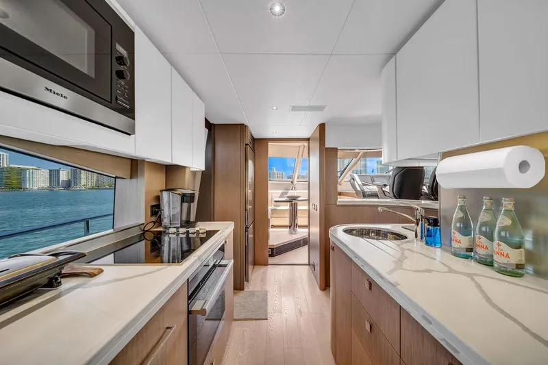 Slide: The Image of Modern kitchen interior of 2021 Sunseeker 86 Yacht with ocean view. - 22