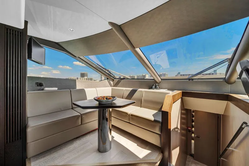 Slide: The Image of Luxurious interior of 2021 Sunseeker 86 Yacht with panoramic windows and elegant seating. - 28
