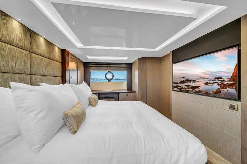 Slide: The Image of Luxurious bedroom interior of 2021 Sunseeker 86 Yacht with modern decor and scenic views. - 34