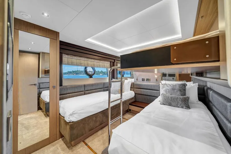 Slide: The Image of Luxurious cabin interior of 2021 Sunseeker 86 Yacht with twin beds and modern decor. - 40