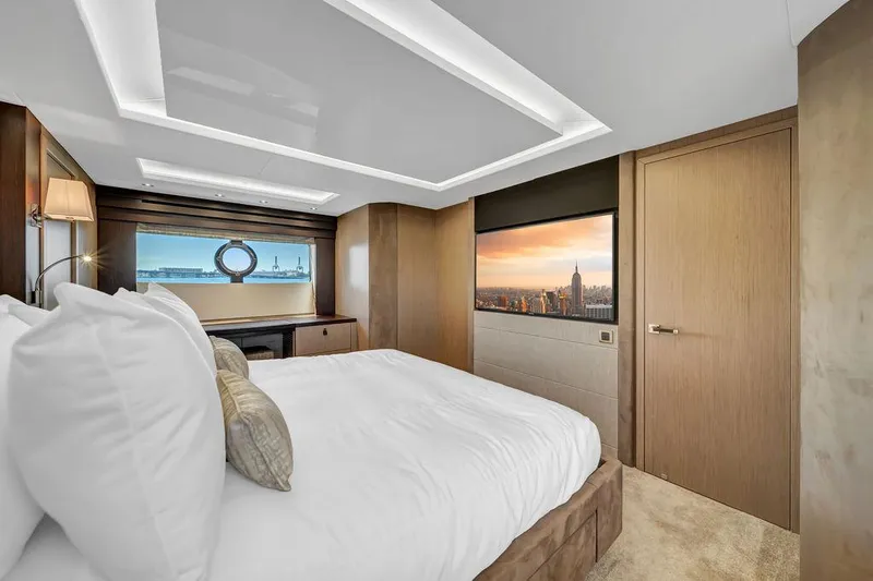Slide: The Image of Luxurious bedroom interior of 2021 Sunseeker 86 Yacht with scenic window views. - 49