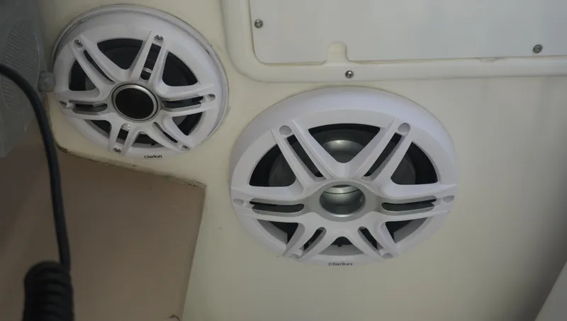 Slide: The Image of White speakers on a 2002 Sea Ray 340 Amberjack boat interior. - 20
