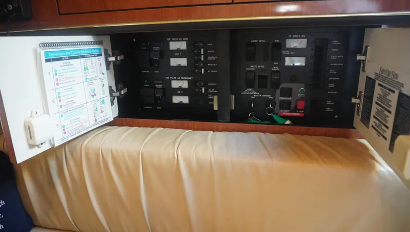 Slide: The Image of Control panel inside 2002 Sea Ray 340 Amberjack boat cabin. - 39