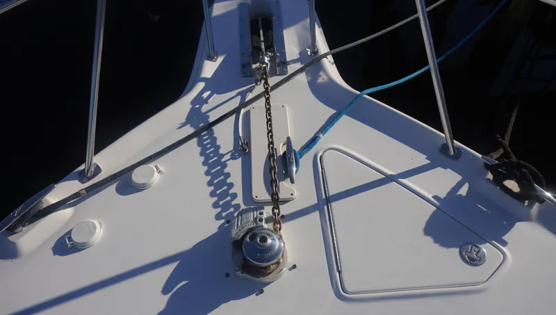Slide: The Image of Bow of 2002 Sea Ray 340 Amberjack with anchor chain and winch. - 44