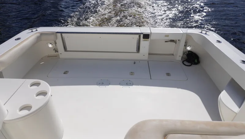 Slide: The Image of 2002 Sea Ray 340 Amberjack boat deck with ocean view. - 8