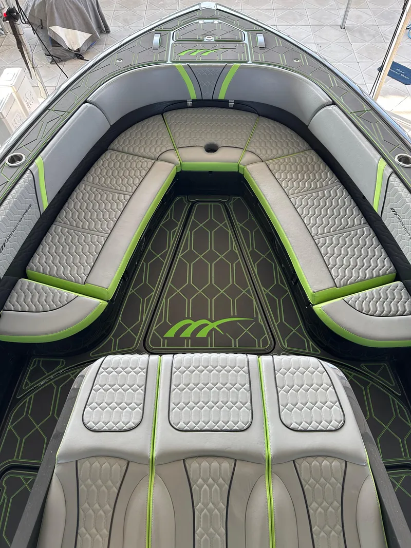 Slide: The Image of 2022 Midnight Express 43 Solstice boat interior with modern seating and stylish design. - 11