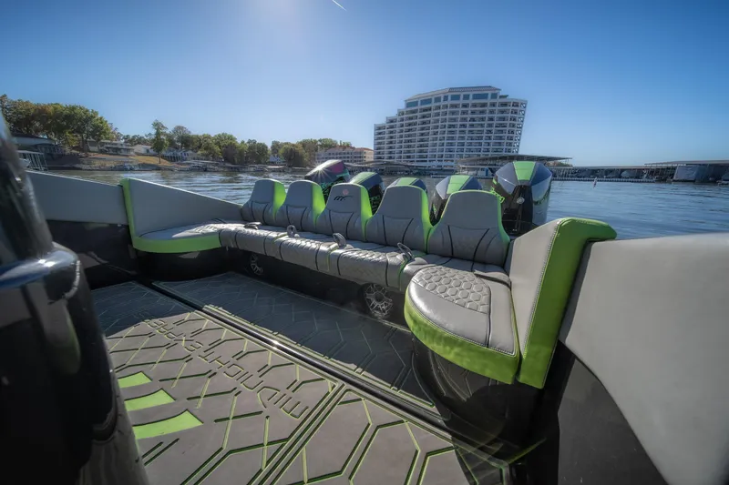 Slide: The Image of Luxury seating on 2022 Midnight Express 43 Solstice boat, with waterfront view. - 30