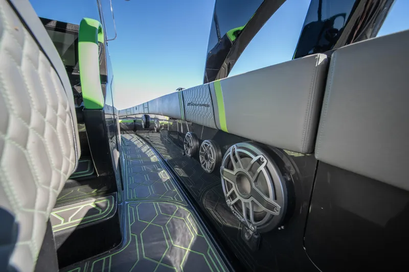 Slide: The Image of Interior of 2022 Midnight Express 43 Solstice boat with modern seating and speakers. - 35