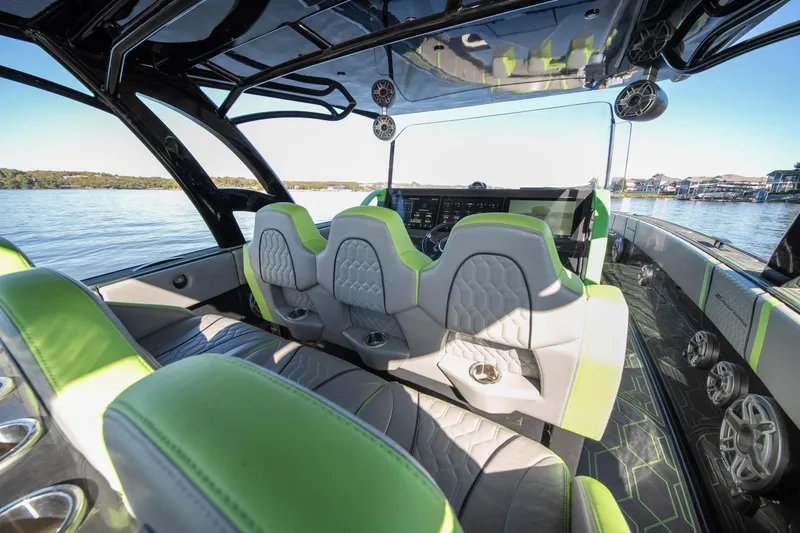 Slide: The Image of Interior of 2022 Midnight Express 43 Solstice boat with modern seating and sleek design. - 42