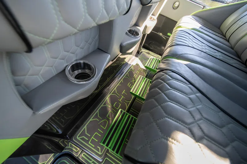 Slide: The Image of Luxurious interior of 2022 Midnight Express 43 Solstice with quilted seats and cup holders. - 47