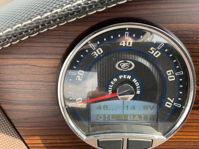 Slide: The Image of Cobalt R5 2016 speedometer displaying 48 mph and 14.8V battery reading. - 14